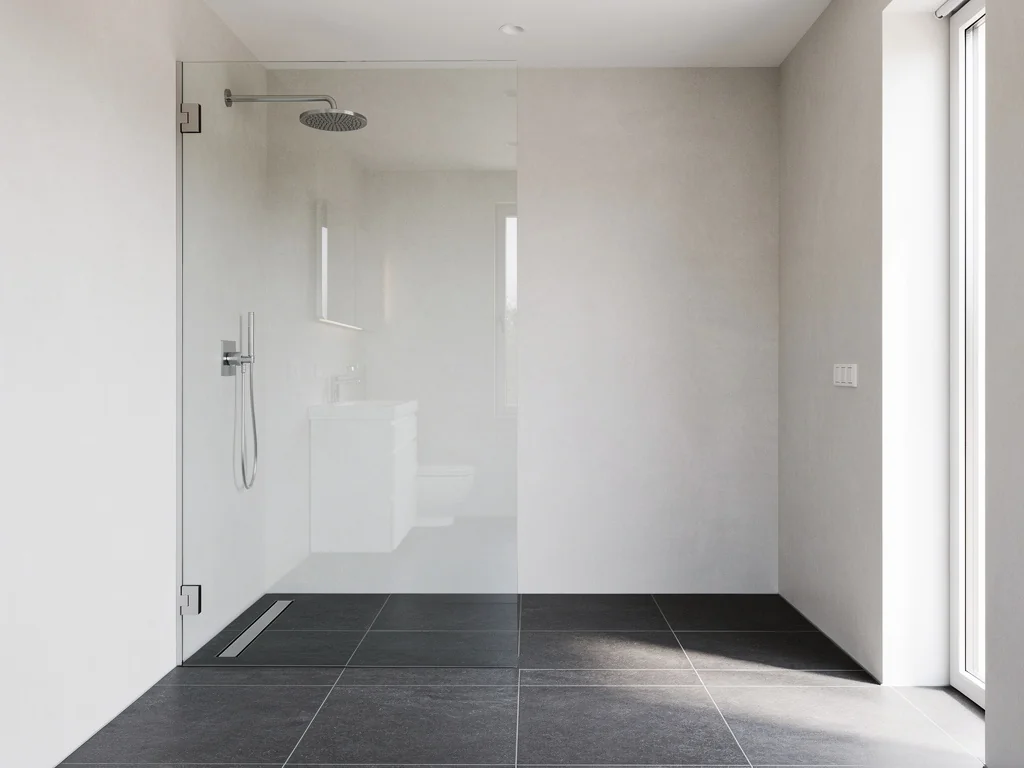 Douche à l'italienne de plain-pied avec paroi vitrée et carrelage anthracite grand format